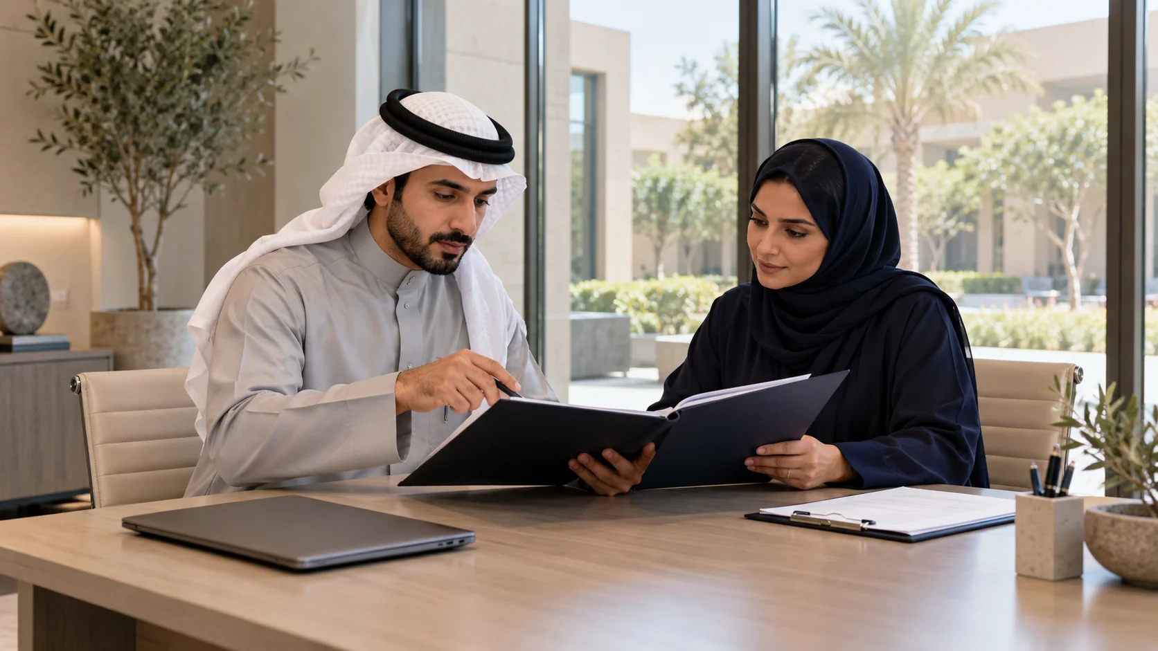 Illustrative Saudi representative in a light gray thobe reviewing a requirement folder with a female coordinator in navy abaya at a meeting table